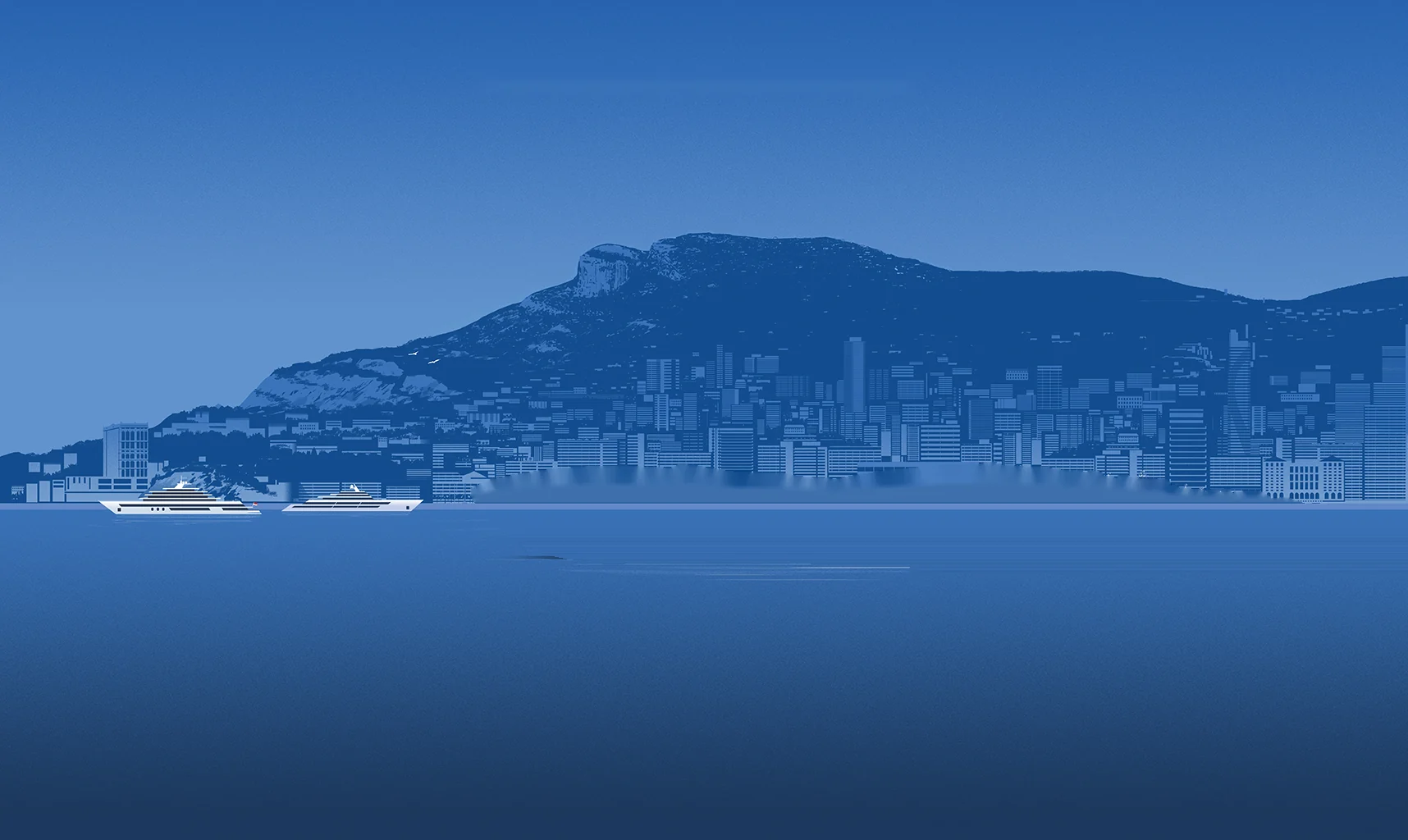 Monaco from the sea: the Rock, the towers of Monte Carlo, two superyachts at anchor
