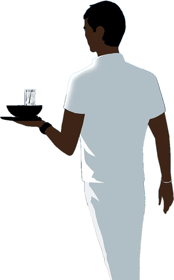 A steward in white carries a tray of drinks